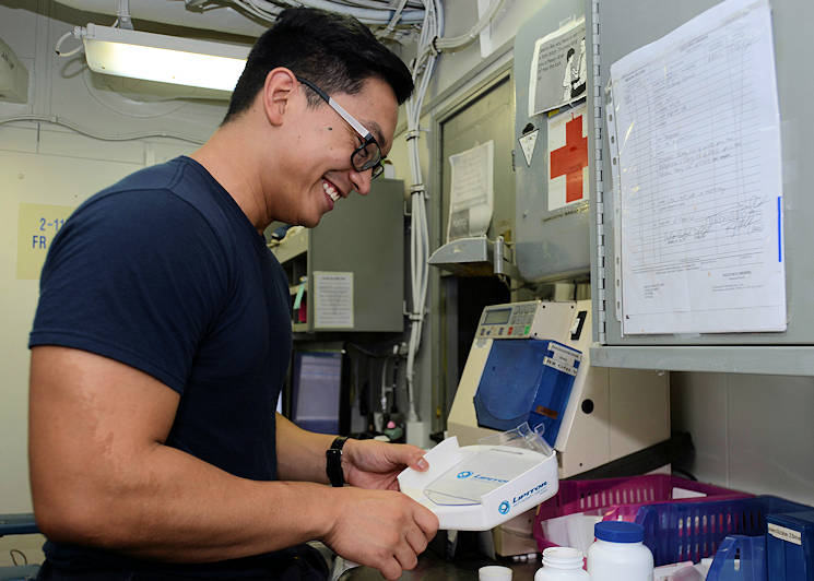 August 23, 2017 - U.S. Navy Hospital Corpsman 2nd Class Robert D. Viloria, from Milwaukee, prepares medication for a patient in the pharmacy aboard the aircraft carrier USS Nimitz (CVN 68), in the Arabian Gulf. Nimitz is deployed in the U.S. 5th Fleet area of operations in support of Operation Inherent Resolve. While in this region, the ship and strike group are conducting maritime security operations to reassure allies and partners, preserve freedom of navigation, and maintain the free flow of commerce. (U.S. Navy photo by Mass Communication Specialist 2nd Class Holly L. Herline)