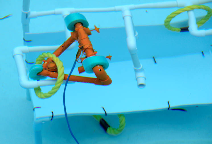 February 18, 2017 – A SeaPerch underwater remotely operated vehicle, manipulates rings onto a rack, during a regional SeaPerch competition held at West Valley College. SeaPerch is an underwater robotics program that equips teachers and students with the resources necessary to build an underwater remotely operated vehicle. Navy Recruiting District San Francisco in collaboration with Navy City Outreach Los Angeles, hosted more than 300 students, educators and parents in this two-day event to help promote an interest in science, technology, engineering and math careers. (U.S. Navy photo by Chief Mass Communication Specialist Mark R. Alvarez)