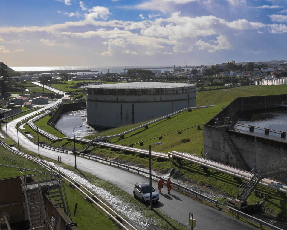 October 18, 2022 - The U.S. Air Force military pier can be seen behind the fuel tanks in the distance at Lajes Field, Portugal. Fuel tankers dock at the pier and replenish the fuel storage tanks capable of storing 38 million gallons of fuel. (U.S. Air Force photo by Airman 1st Class Lauren Jacoby)