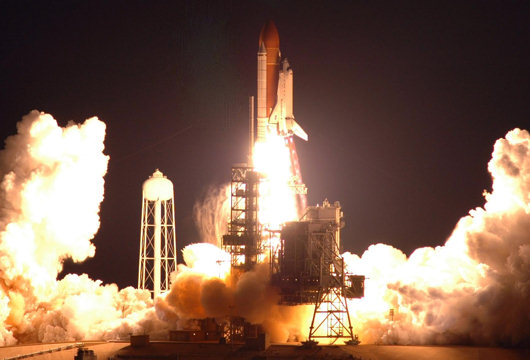 The Space Shuttle Endeavour lights up the early morning sky at NASA's Kennedy Space Center in Florida, lifting off at 2:28 a.m. EDT on Tuesday, March 11, 2008. Endeavour's mission, STS-123, will carry two new components to the International Space Station: the first section of the Japanese Kibo lab and Canada's two-armed robotic system, known as Dextre. Endeavour will also deliver a new station crew member, Garretr Reisman, and bring back European Space Agency astronaut Leopold Eyharts, who has been on the station since Feb. 9, 2008.