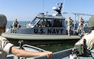 Marine, Navy, and Coast Guard members training on fast boats in the San Diego, California bay area during July 2010.